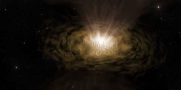 An artist’s impression of what an active galactic nucleus might look like at close quarters. The accretion disk produces the brilliant light in the centre. The broad-line region is just above the accretion disk and lost in the glare. Dust clouds are being driven upwards by the intense radiation. Credit: Peter Z. Harrington